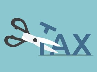 rendering of the word tax being cut with scissors