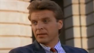 A close up of David Rasche as Sledge Hammer.