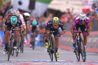 Caleb Ewan takes a narrow victory on the Giro d'Italia's seventh stage.