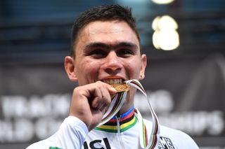 Colombia's Fabian Hernando Puerta Zapata celebrates his gold medal on the podium after the men's Keirin final