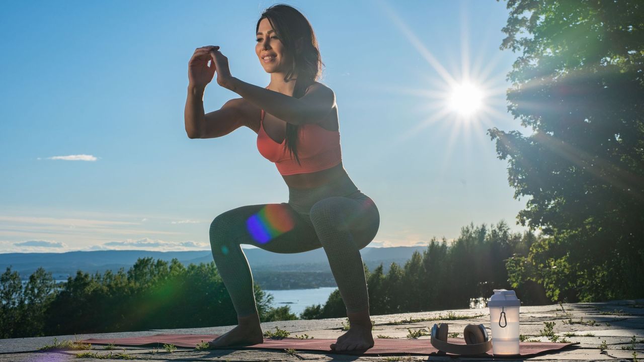 A woman exercising outside