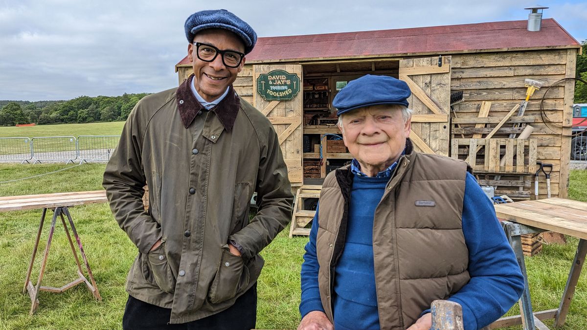 Jay Blades and David Jason standing outside a shed in David and Jay&#039;s Touring Toolshed 