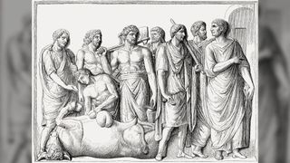 A haruspex observing a liver of a sacrificed animal in ancient Rome.