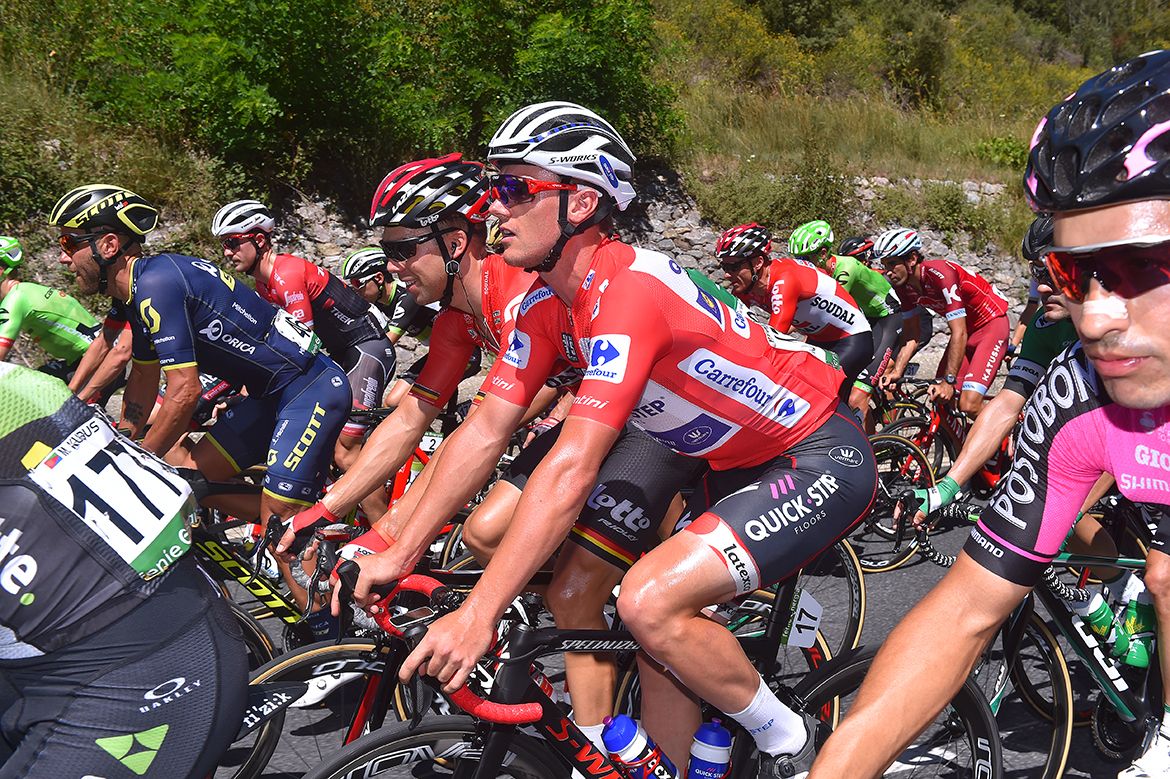 Red jersey Yves Lampaert in the peloton