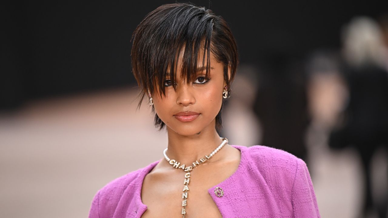 Tyla wears a Chanel skirt suit at Paris Fashion Week with a diamond chanel necklace