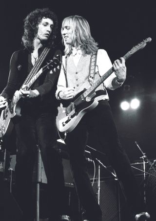 Mike Campbell (left) and Tom Petty perform May 14, 1977, at London's Hammersmith Odeon