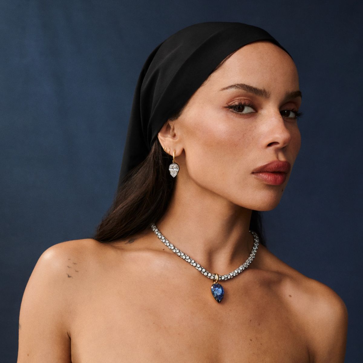 zoe kravitz posing in diamond jewellery from jessica mccormack