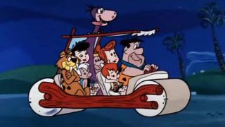 The Flintstones in their fly mobile