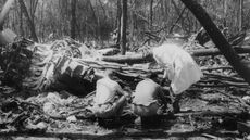 Officials search the crash site in 1961