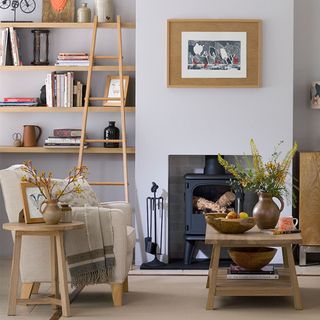 Living room shelving ideas with grey walls and wooden shelves