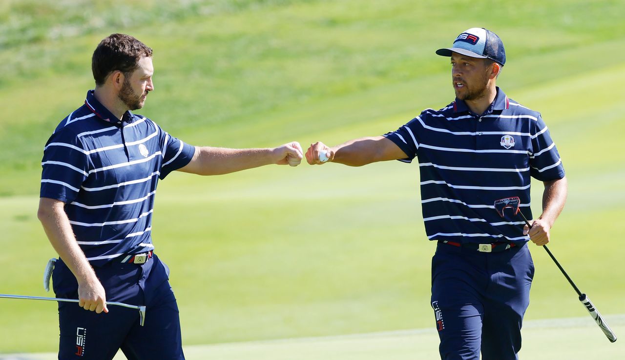 Patrick Cantlay and Xander Schauffele fist bump at the Ryder Cup