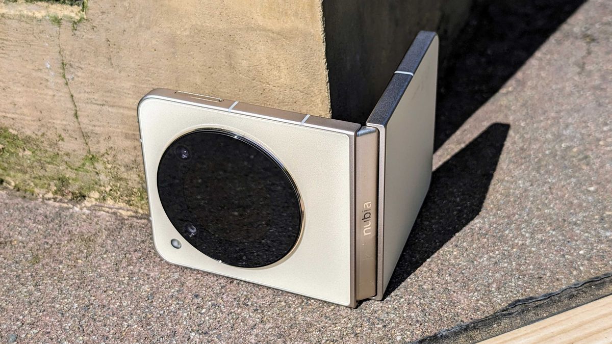 The Nubia Flip 5G bent to match the corner of a pillar
