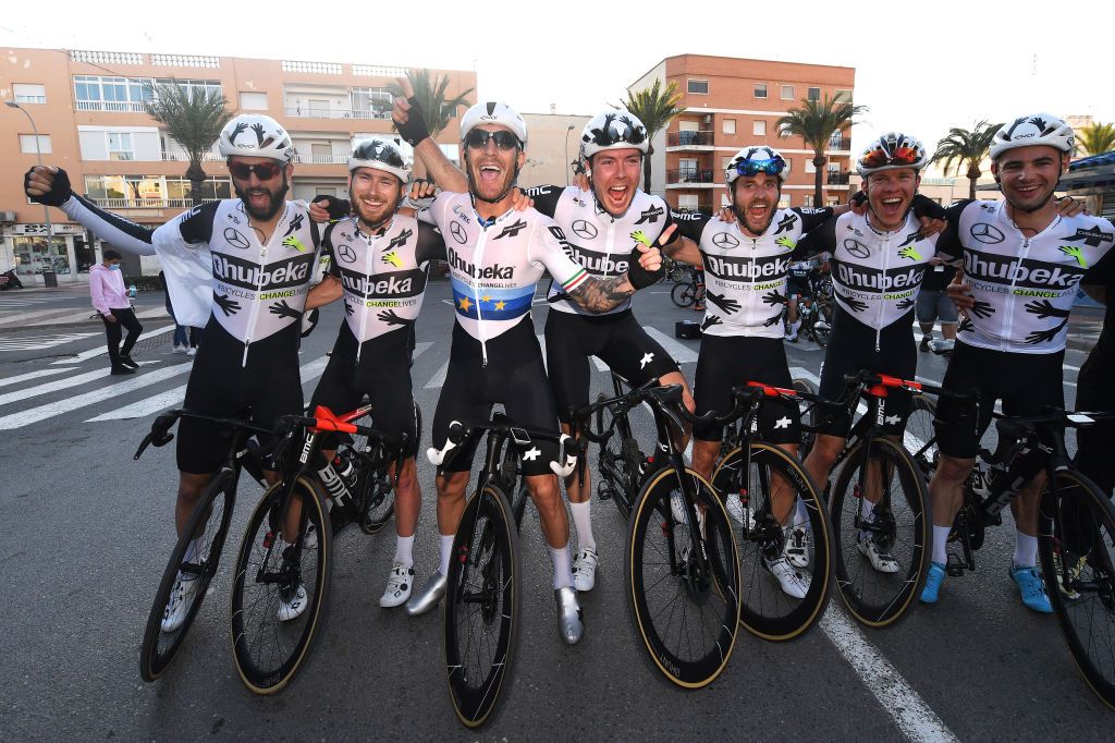 ROQUETAS DE MAR SPAIN FEBRUARY 14 Arrival Carlos Barbero of Spain Sean Bennett of The United States Victor Campenaerts of Belgium Giacomo Nizzolo of Italy Matteo Pelucchi of Italy Emil Vinjebo of Denmark Maximilian R Walscheid of Germany and Team Team Qhubeka Assos Celebration during the 34th Clsica de Almeria 2021 a 1833km race from Pueblo de Vicar to Roquetas de Mar ClasicaAlmeria21 on February 14 2021 in Roquetas de Mar Spain Photo by Tim de WaeleGetty Images