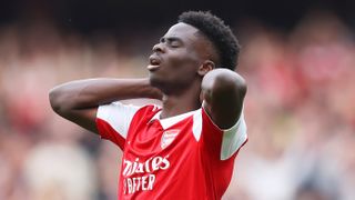 Bukayo Saka of Arsenal reacts during the Premier League match between Arsenal FC and Brighton & Hove Albion at Emirates Stadium 