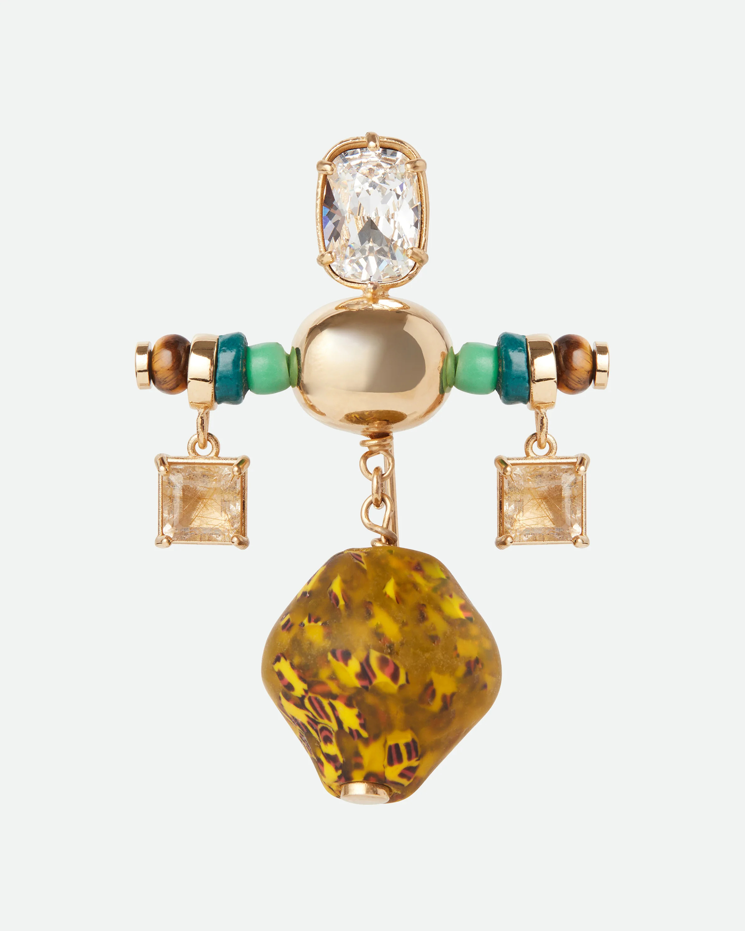 A Wales Bonner brooch.