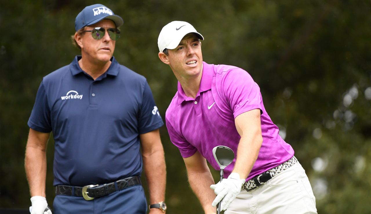 Rory and Phil tee off