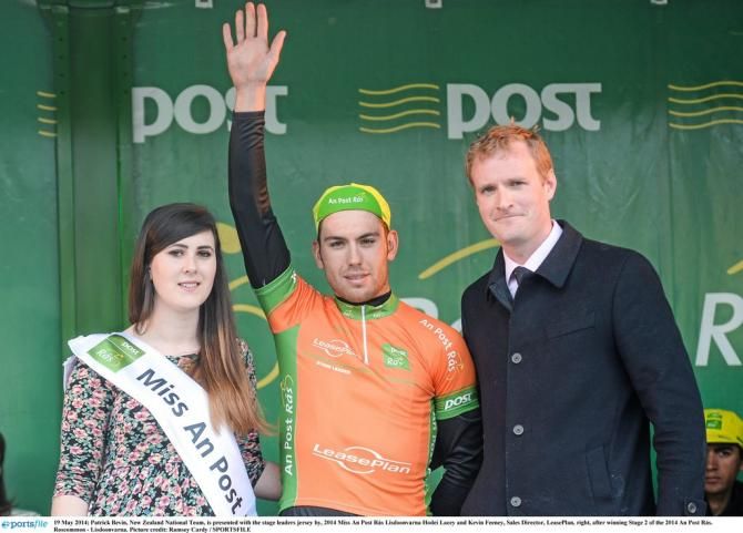 Patrick Bevin (New Zealand National Team) is presented with the stage winners jersey