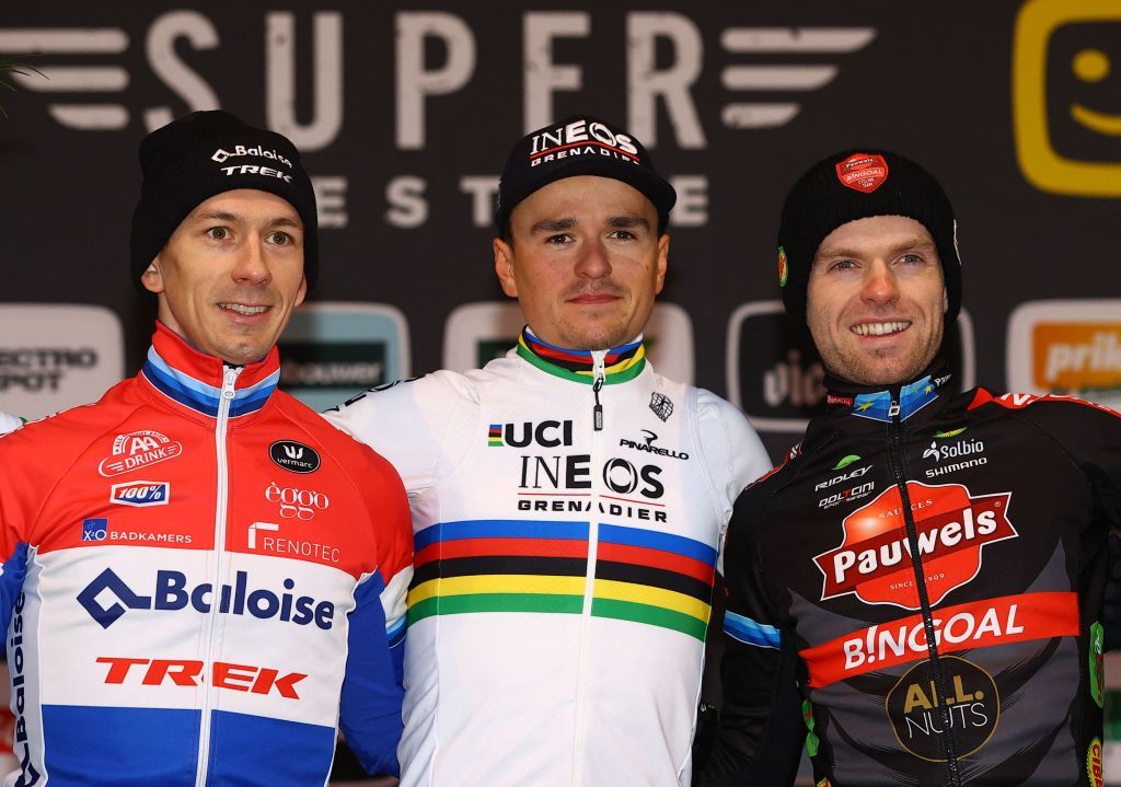 From L Secondplaced Dutch Lars Van Der Haar firstplaced British Thomas Pidcock and thirdplaced Belgian Eli Iserbyt pose on the podium after the Men Elite race of the Superprestige Boom 2022 fourth stage of the Superprestige cyclocross competition in Boom on December 3 2022 Belgium OUT Photo by DAVID PINTENS Belga AFP Belgium OUT Photo by DAVID PINTENSBelgaAFP via Getty Images
