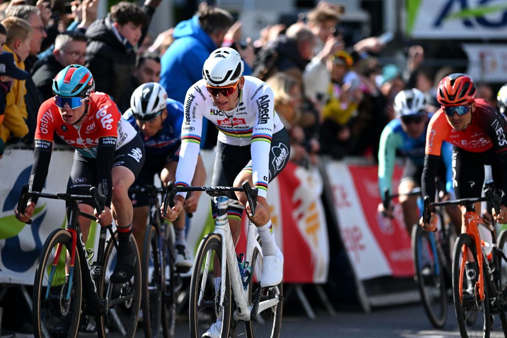 LIEGE BELGIUM APRIL 24 LR Maxim Van Gils of Belgium and Team Lotto Dstny Mathieu van der Poel of The Netherlands and Team Alpecin Deceuninck and Thomas Pidcock of The United Kingdom and Team INEOS Grenadiers cross the finish line during the 110th Liege Bastogne Liege 2024 Mens Elite a 2545km one day race from Liege to UCIWT on April 24 2024 in Liege Belgium Photo by Dario BelingheriGetty Images