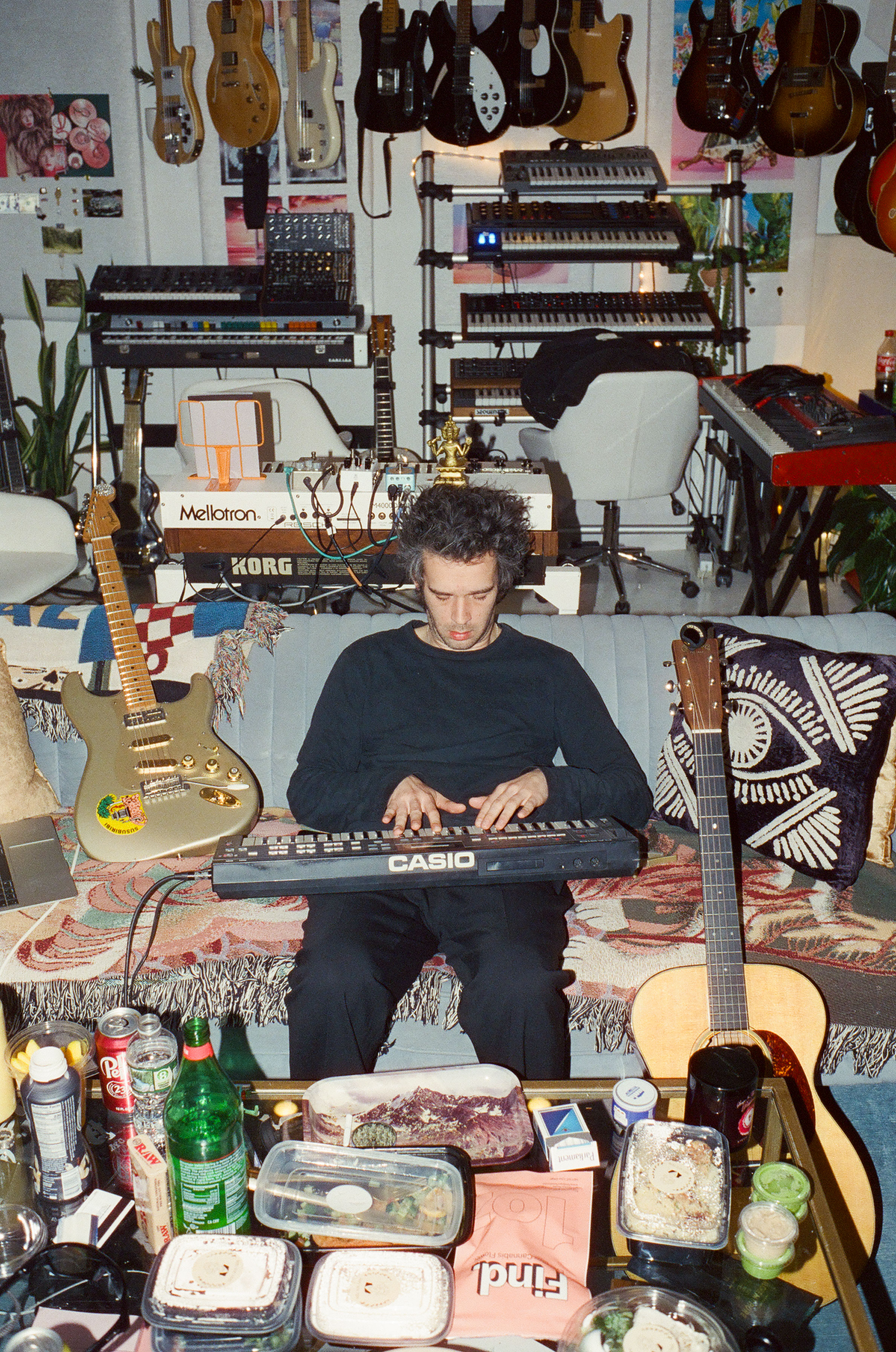 Matty Healy surrounded by synths