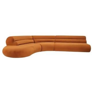 A curved orange sofa from 1stDibs