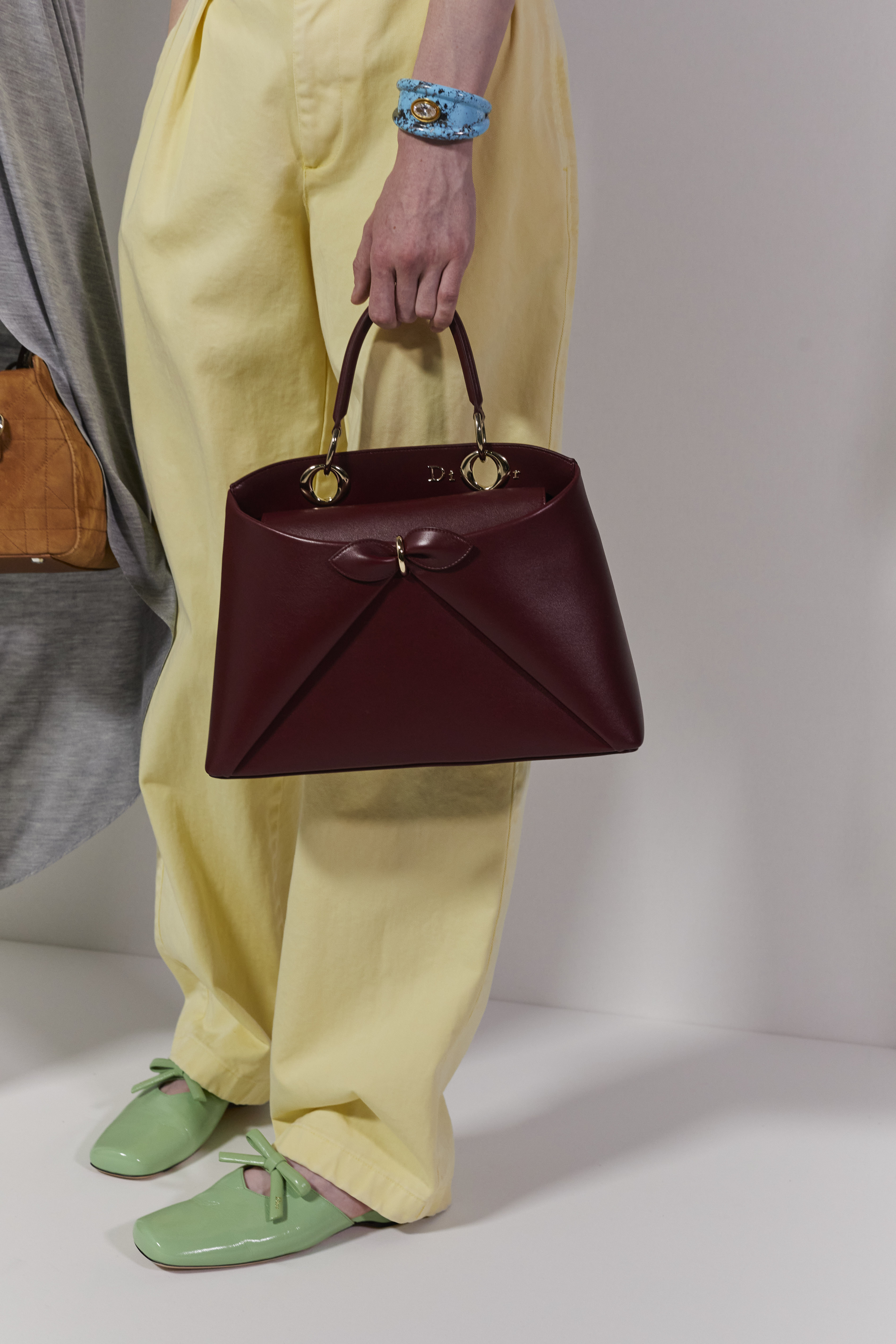 close ups of models at Dior wearing Jonathan Anderson&#039;s shoes and bags for Dior