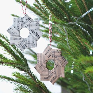 handmade paper decorations on christmas tree