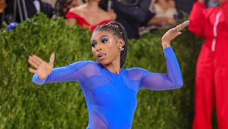 new york, new york september 13 gymnast nia dennis attends the 2021 met gala celebrating in america a lexicon of fashion at metropolitan museum of art on september 13, 2021 in new york city photo by theo wargogetty images