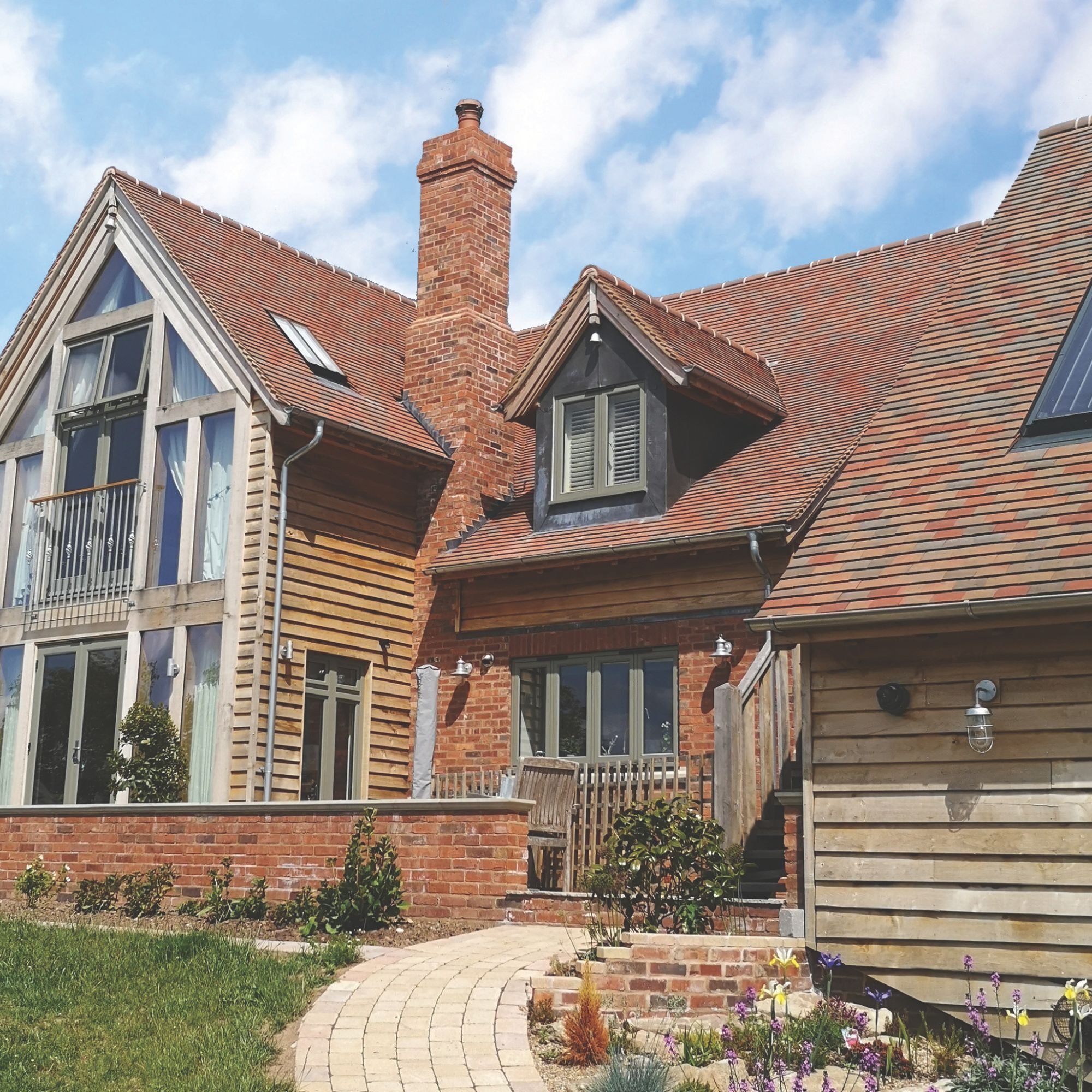 Mixed blend of Dreadnought Rustic tiles on roof of home