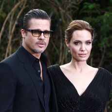 Angelina Jolie and Brad Pitt attend a private reception for 'Maleficent' in 2014