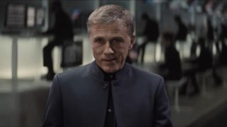 Christoph Waltz stands in his control room menacingly in Spectre.