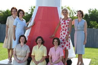 Left to right: Laura Ault as Jo Schirra, Nora Zehetner as Annie Glenn, Victoria White as Marge Slayton, Rachel Buttram as Betty Grissom, Shannon Lucio as Louise Shepard, Jade Albany Pietrantonio as Rene Carpenter and Eloise Mumford as Trudy Cooper pose for LIFE magazine in the third episode of National Geographic's "The Right Stuff," streaming on Disney Plus.