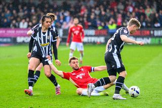 Jayden Luker of Notts County FC tackles Luke Garbutt of Salford City FC during the Sky Bet League 2 match between Salford City and Notts County at The Peninsula Stadium in Salford, United Kingdom, on April 3, 2026. (Photo by MI News/NurPhoto)