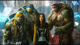 (left to right) Michaelangelo, Leonardo, Megan Fox and Raphael in Teenage Mutant Ninja Turtles (2014)