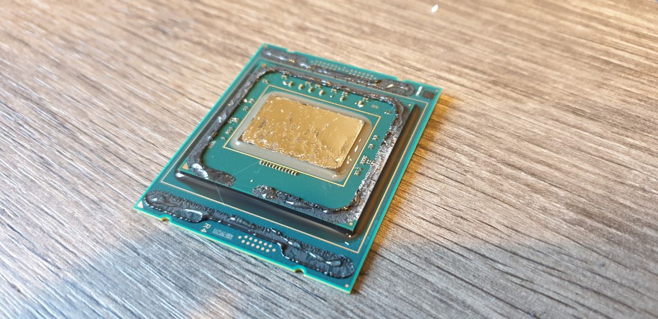 the process of delidding an old Intel chip and applying liquid metal between the die and the IHS