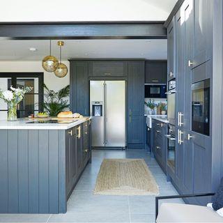 black kitchen with floor runner