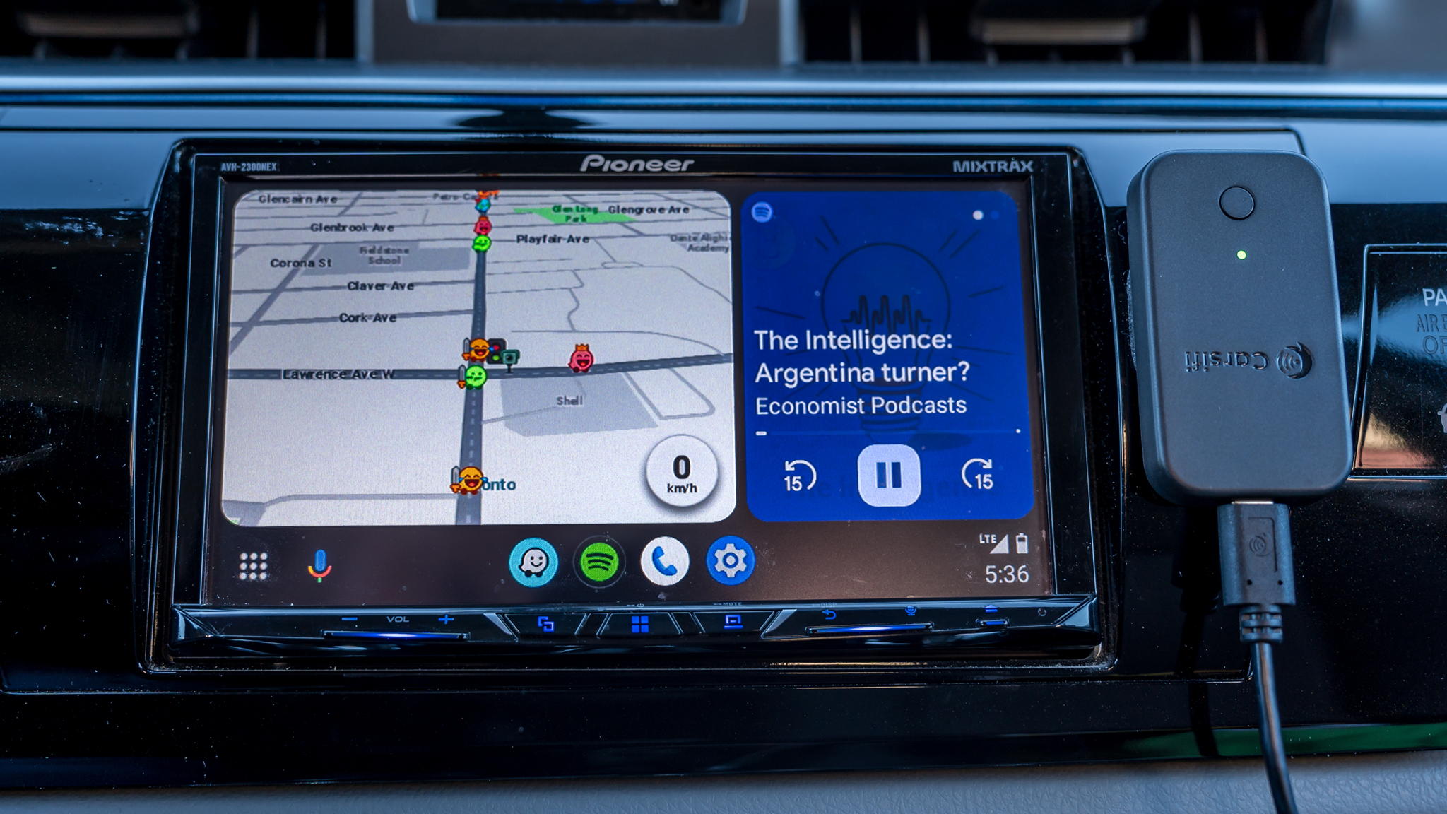 Carsifi Android Auto adapter next to the front view of the Android Auto screen.