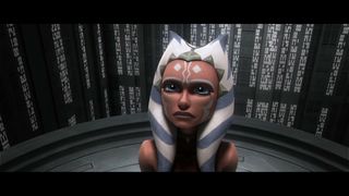 Still from Star Wars: The Clone Wars Season 5 Episode 20: The Wrong Jedi. A close up of Ashoka's face (orange skin, white face markings, white head tails with blue stripes).