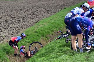 Italian Anna Trevisi L and Italian Marta Bastianelli 2ndL of UAE Team ADQ react after a crash during the womens elite race of the Classic BruggeDe Panne oneday cycling race from Brugge to De Panne on March 23 2023 Photo by DIRK WAEM Belga AFP Belgium OUT Photo by DIRK WAEMBelgaAFP via Getty Images