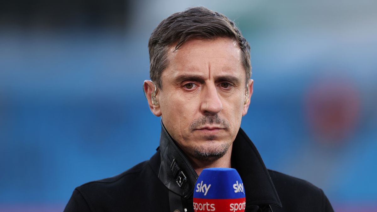 Gary Neville, seen with a Sky Sports microphone, has joined Dragons&#039; Den.