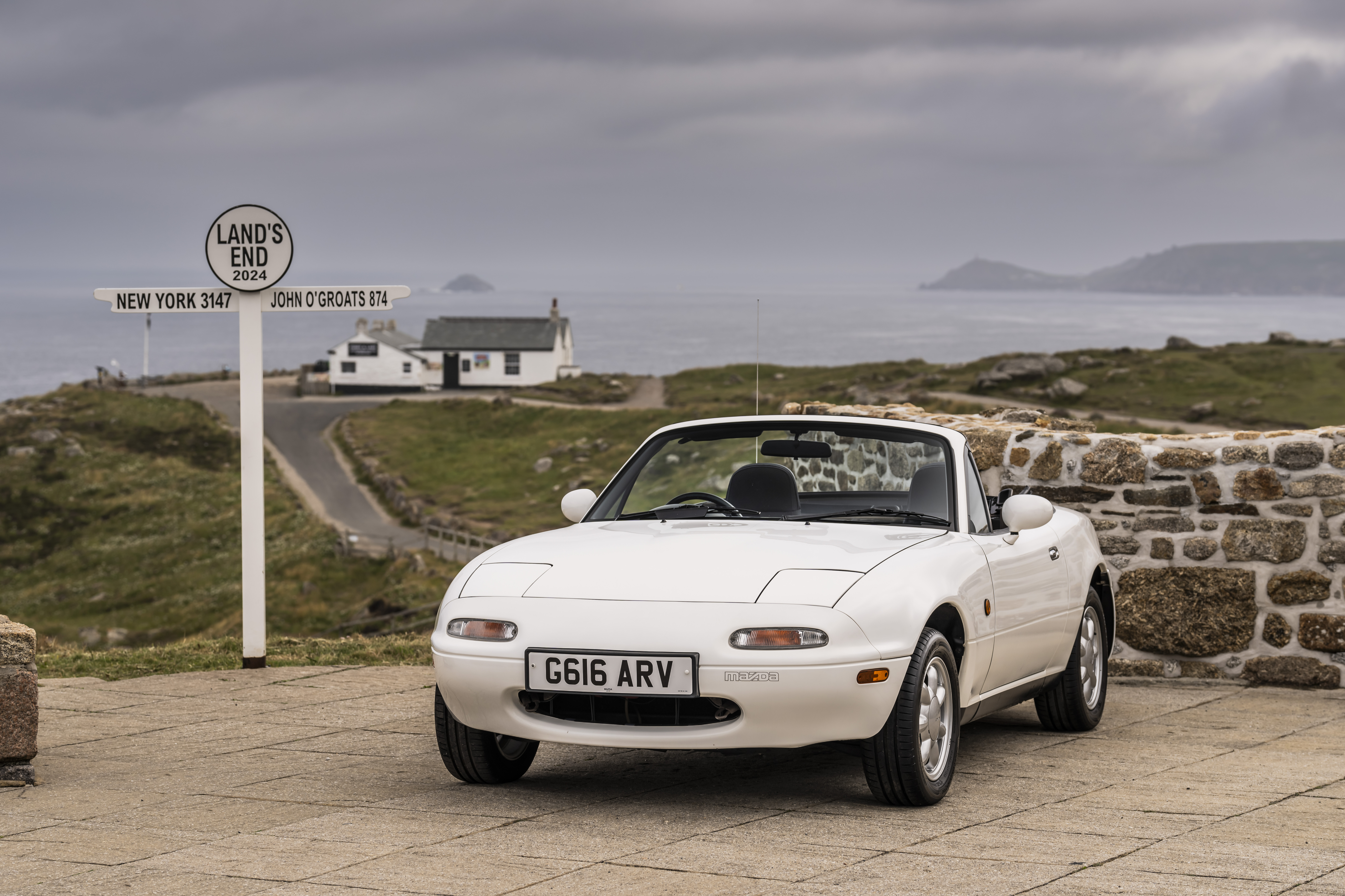 A mazda MX5, zooming through great britain