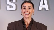 Suranne Jones attends the "Hostage" UK screening wearing a chocolate brown suit