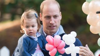 Prince William, Duke of Cambridge and Princess Charlotte of Cambridge attend a children's party for Military families during the Royal Tour of Canada on September 29, 2016 in Victoria, Canada.