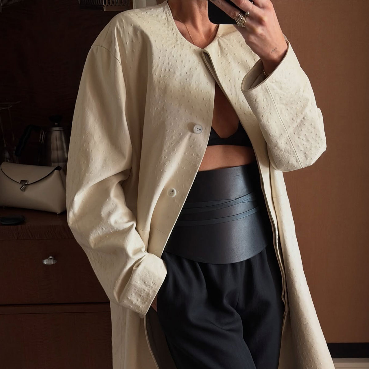 @hannahlewisstylist closeup selfie in loulou de saison cream ostrichg leather coat 