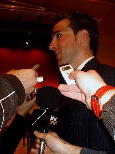 Haimar Zubeldia shies away from the crush of journalists