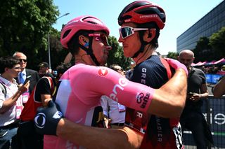 2023 Giro d'Italia stage 21: overall winner Primoz Roglič and Geraint Thomas, second, exchange a hug on the final day
