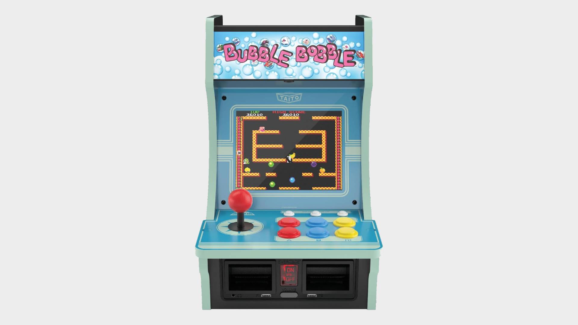 Front view of Evercade Alpha Taito Edition with Bubble Bobble marquee, decals, and gameplay on screen.