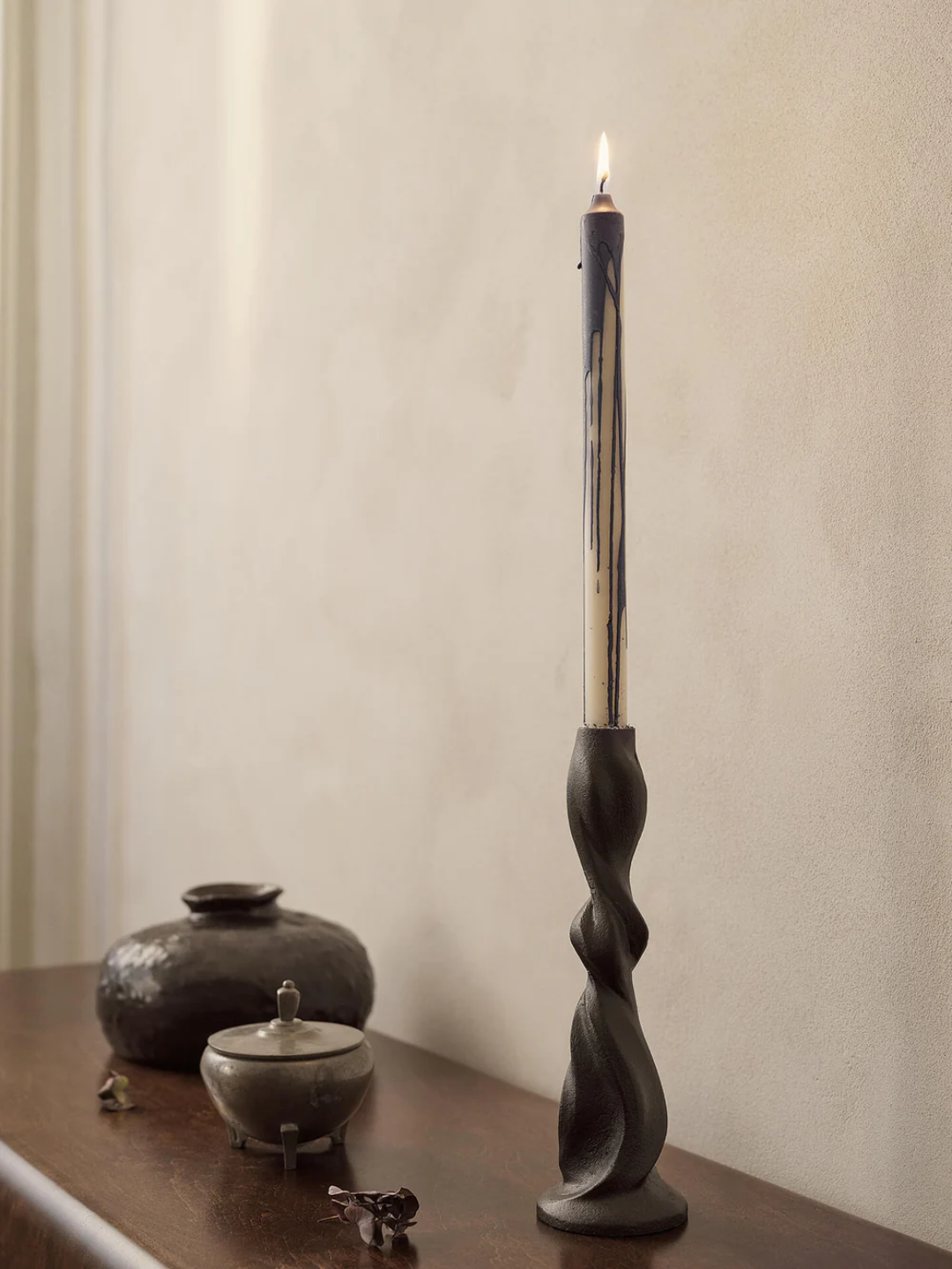 A Dryp Candle with blue wax from Ferm Living