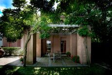 Michael Graves house exterior with pink walls and planting