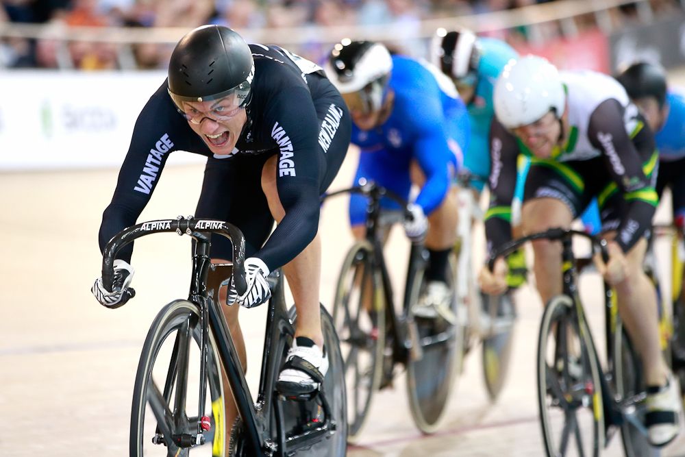 Sam Webster of New Zealand wins his heat in the Men's Keirin